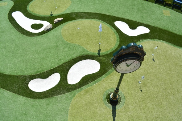 Augusta Synthetic grass golf course with sand traps and golfers